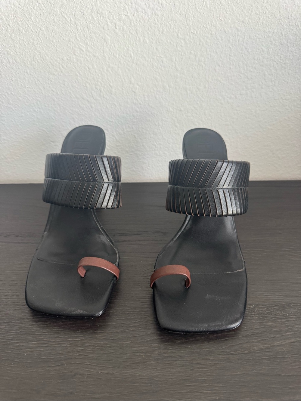 Delta Black Slide Mules with Brown Toe Loop